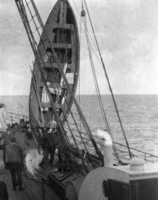 RMS Titanic lifeboat being emptied of water aboard the Carpathia